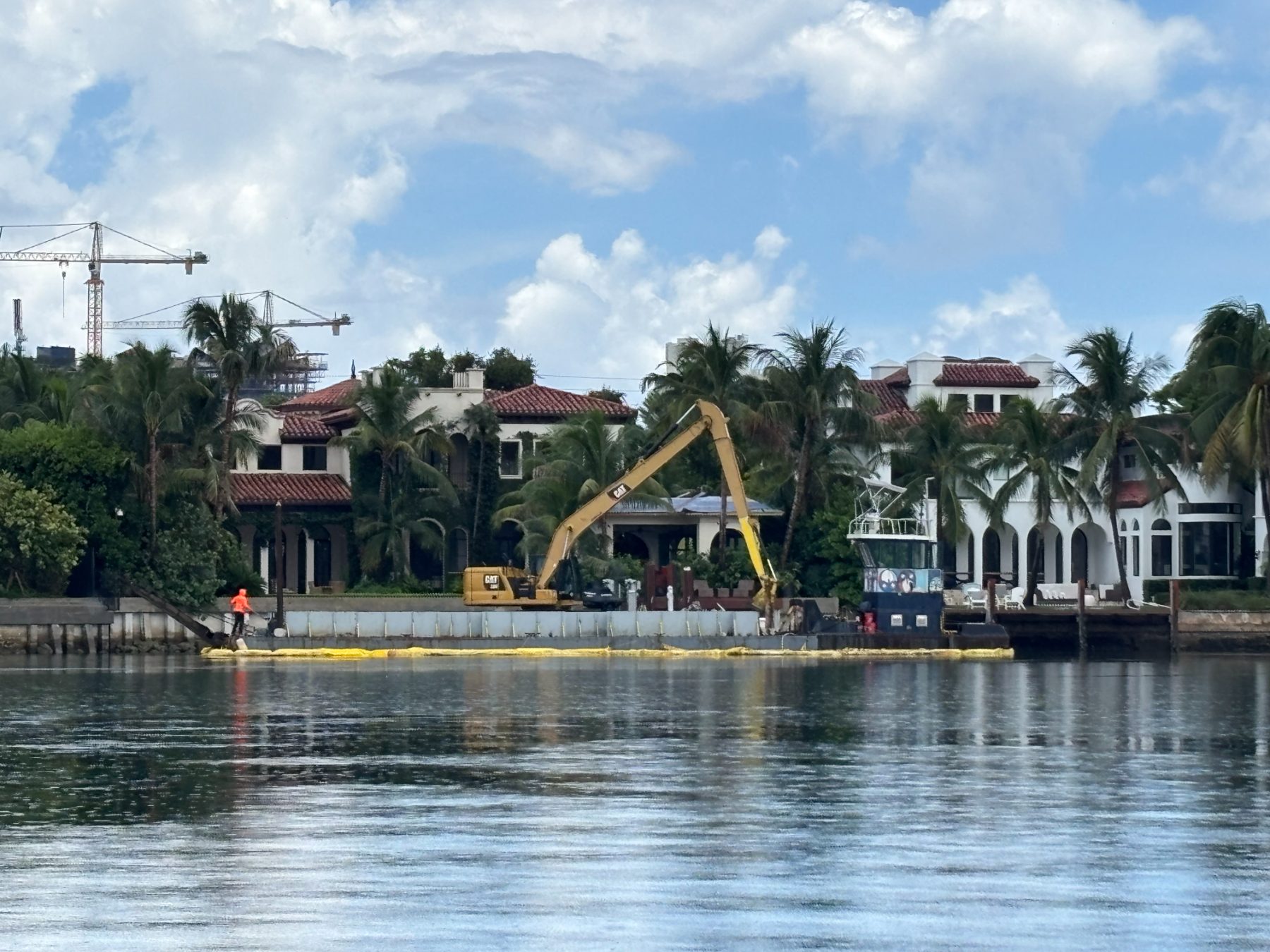 Dredging alongside a commercial waterfront berth